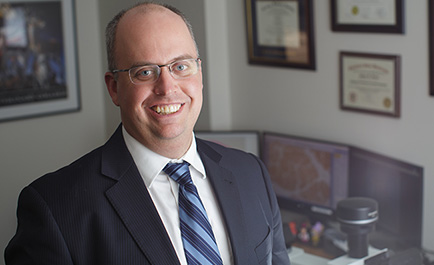 Dr. Adam Stern, an associate professor of forensic pathology
