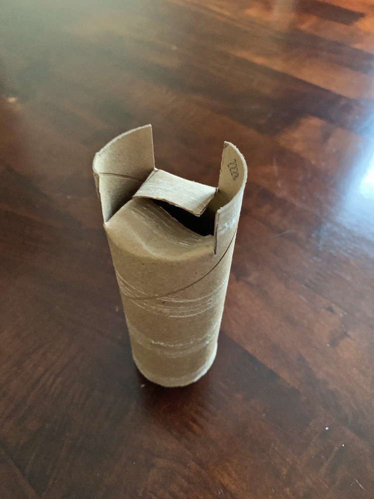 toilet paper tube with ends folded