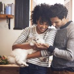 couple holding a cat