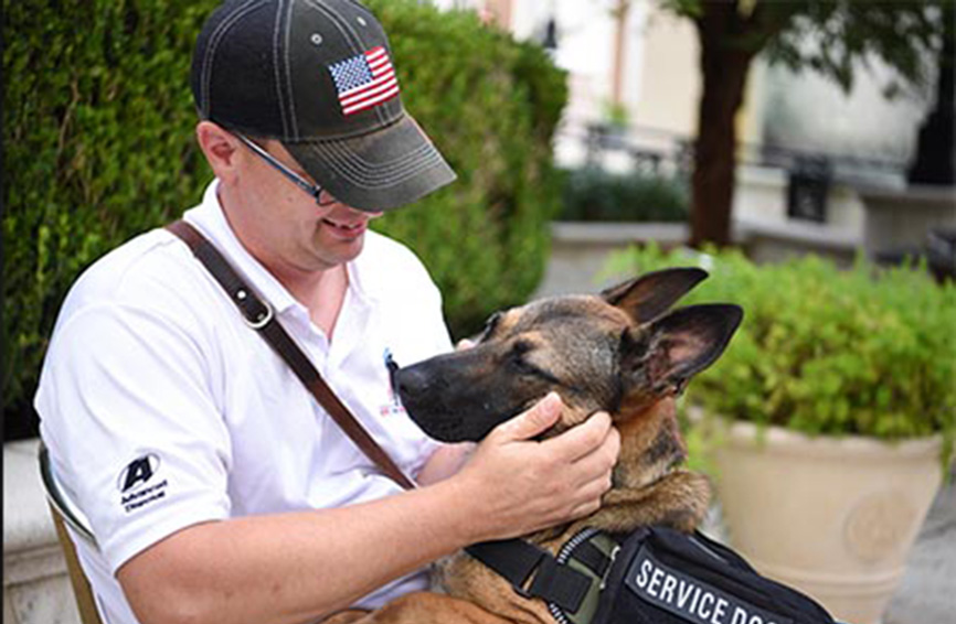 A soldier and his service dog