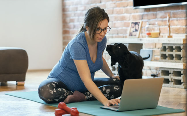 Woman online training with dog