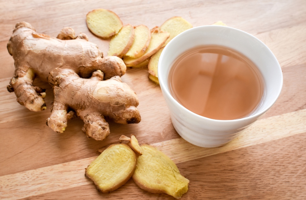 ginger root and cup of ginger tea
