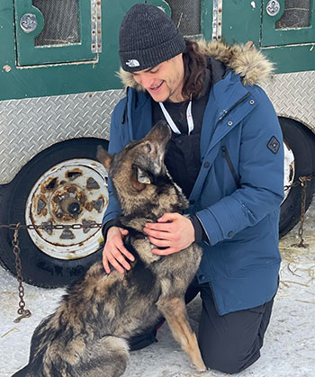 Dr. Zac Pilossoph, working at the Iditarod. 