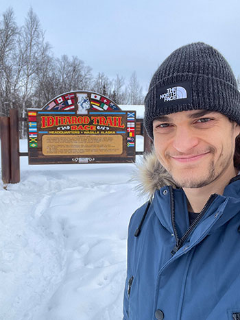 Dr. Zac Pilossoph, working at the Iditarod.